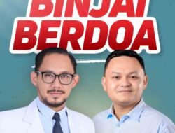 dr Donal Anjar Simanjuntak dan pasangannya peduli Kepada Warga Terkena Banjir di Binjai